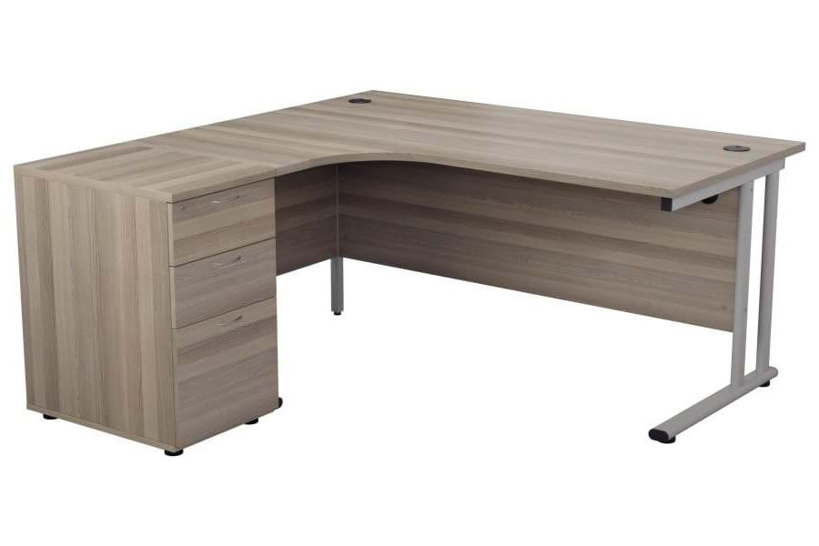 View 180cm x 120cm Grey Oak LShaped LeftHanded Corner Desk Including 3 Drawer Filing Pedestal 3 Cable Manage Ports Silver Steel Frame Kestral information